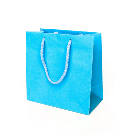 Blue paper bag isolated on white backgrundの写真素材