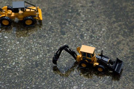 Forklifts and trucks under construction for urban reconstruction.の写真素材