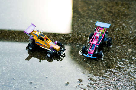 A small, offroad toy car is facing us.の写真素材