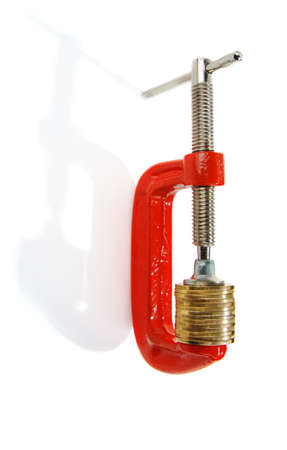clamp with coins isolated on whiteの写真素材