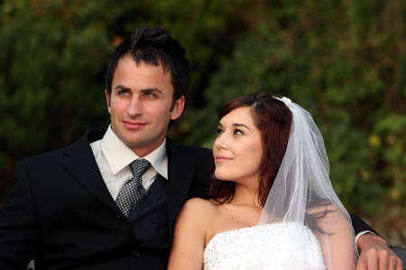 Attractive looking young couple on their wedding dayの写真素材