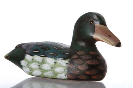 Wooden duck painted in Mallard colors for a decoy or decorationの写真素材