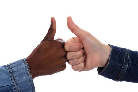 Thumbs up sign from an African black woman and a caucasian woman