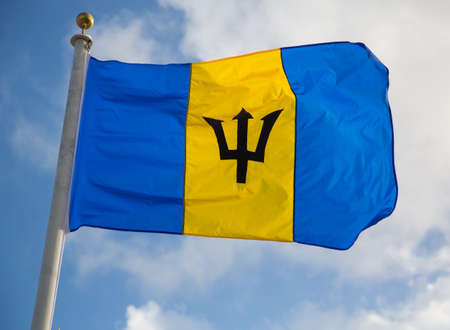 The Barbados Flaf fluttering in the island breezeの写真素材
