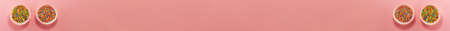 Banner of four cupcake liners with colored sugar inside from above. Flat lay top view. Confectionery cooking concept on bright pink paper background. National cooking dayの写真素材