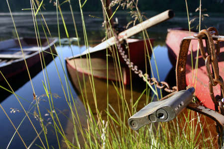Locked boat in the lakeの写真素材