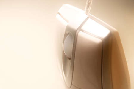 Computer mouse close-up, a bit toned & blured in case to do the image more acceptable for backgroundsの写真素材