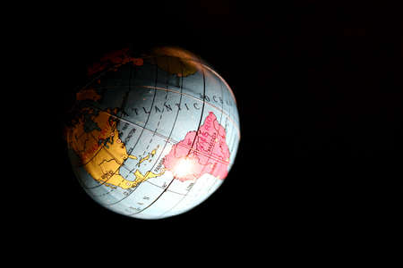 Globe against the blackの写真素材