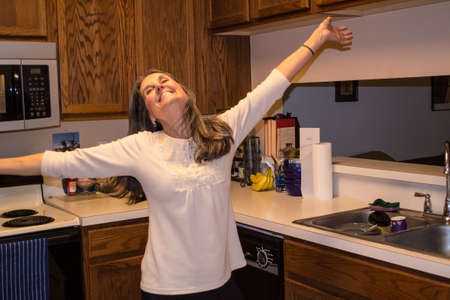 Woman loves her Kitchen and Homeの写真素材