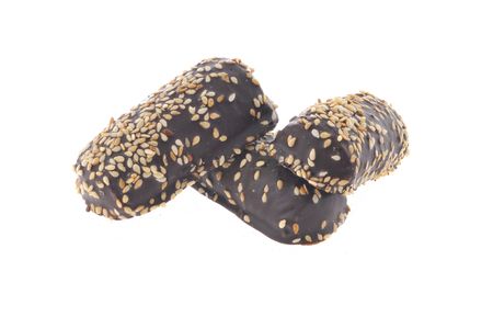 Delicious cookie covered with dark chocolate fondant isolated on white backgroundの写真素材