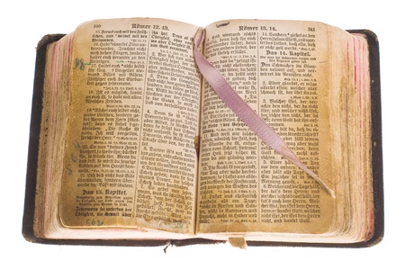  Old gothic antique vintage open bible with bookmark isolated on white background with cliping path の写真素材
