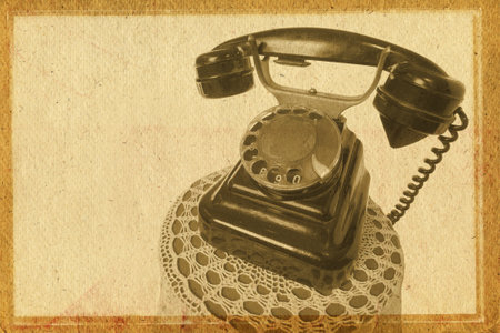 Old grunge vintage Phone on white isolatedの写真素材