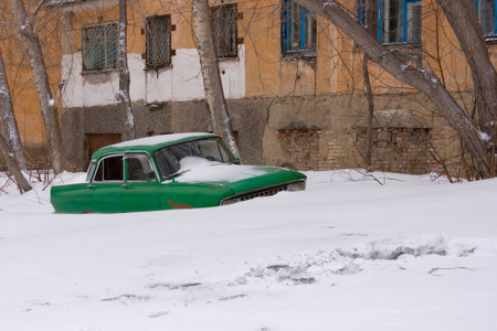 Old car in winter under the snow. High quality photoの写真素材