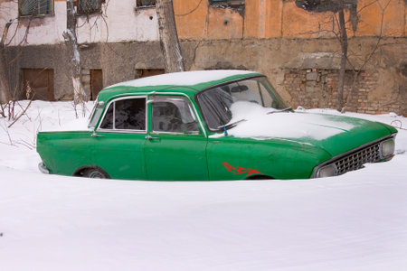 Old car in winter under the snow. High quality photoの写真素材
