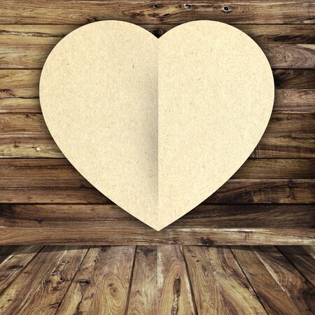 heart on wood backgroundの写真素材