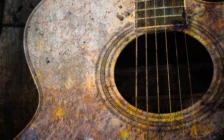 guitar on old wallの写真素材