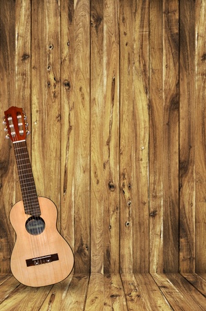 ukulele on wood backgroundの写真素材