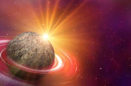 planet with sunrise on the background of starsの写真素材