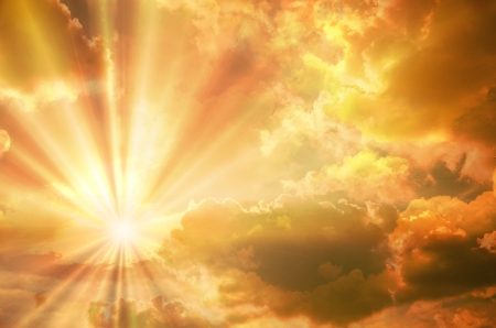 Sunset / sunrise with clouds, light rays and other atmospheric effectの写真素材