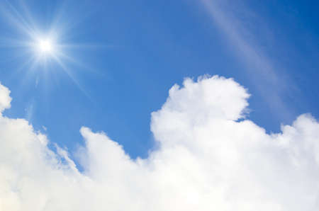 Sun and blue sky with clouds.の写真素材