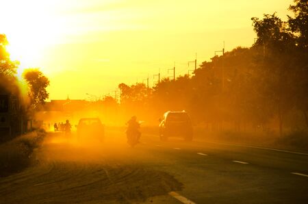 car driving through the dustの写真素材
