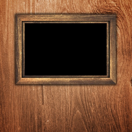 Vintage wooden frame on wood background
の写真素材