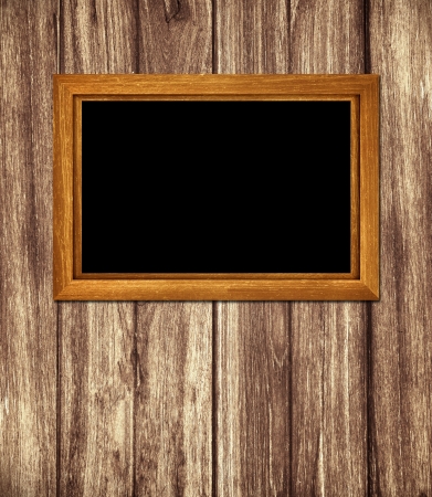 Vintage wooden frame on wood backgroundの写真素材