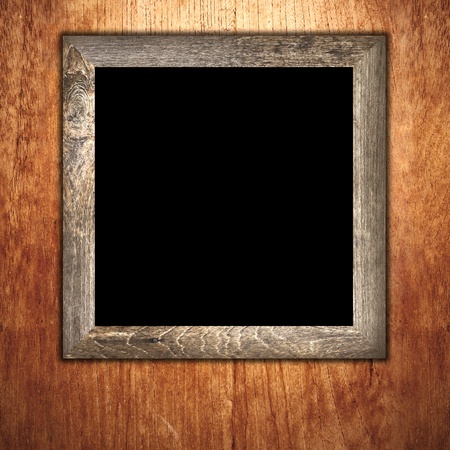 Vintage wooden frame on wood backgroundの写真素材
