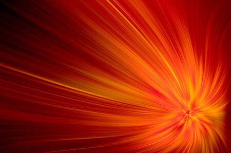 Red and yellow rays on black backgroundの写真素材