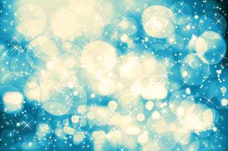 Gold Christmas background with sparkles and stars designの写真素材
