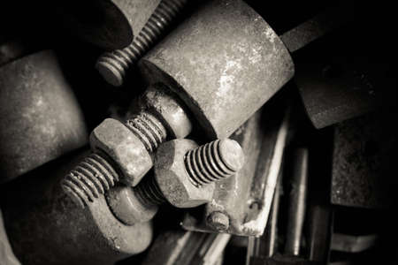 Detail of different metallic bolts and nutsの写真素材