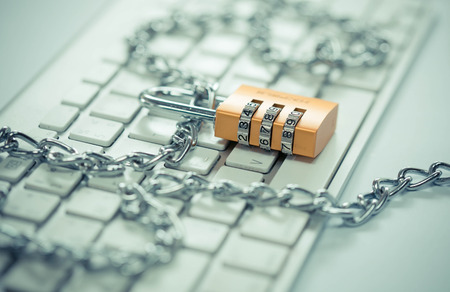 Padlock on keyboardの写真素材