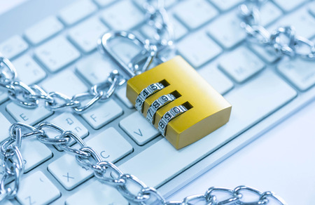 Padlock on keyboardの写真素材