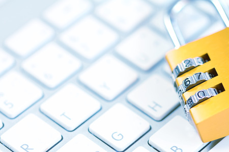 Padlock on keyboardの写真素材