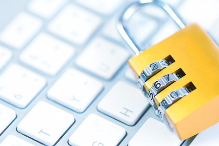 Padlock on keyboardの写真素材