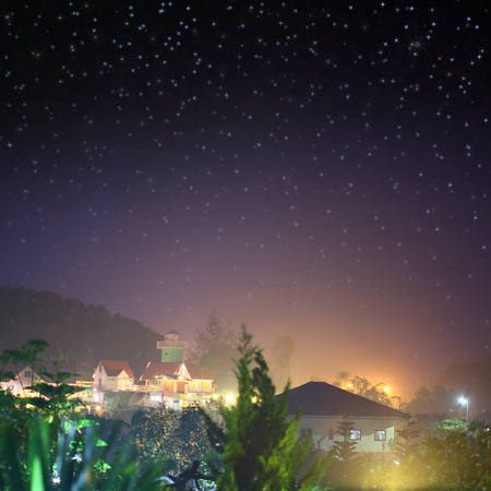 Small cottage at nightの写真素材