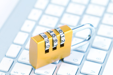 Padlock on keyboardの写真素材