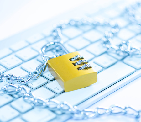 Padlock on keyboardの写真素材