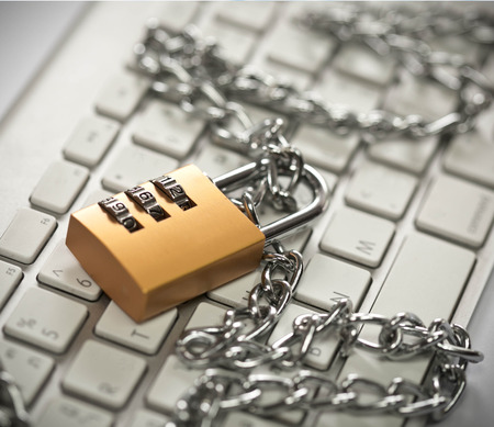 Padlock on keyboardの写真素材
