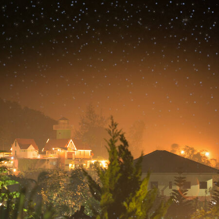 Small cottage at nightの写真素材