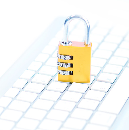 Padlock on keyboardの写真素材