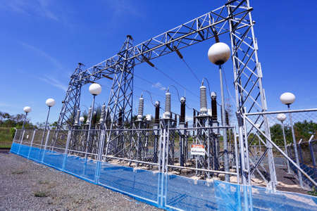 Electric power station in blue cloudy skyの写真素材
