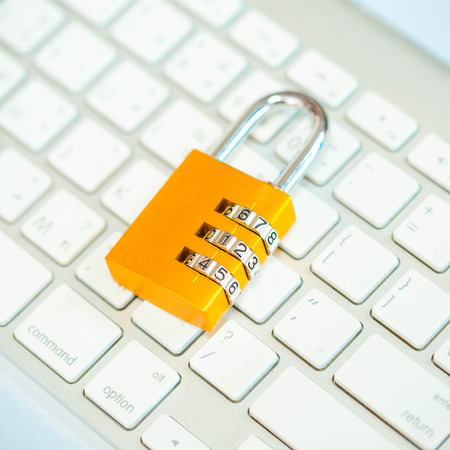 Padlock on keyboardの写真素材