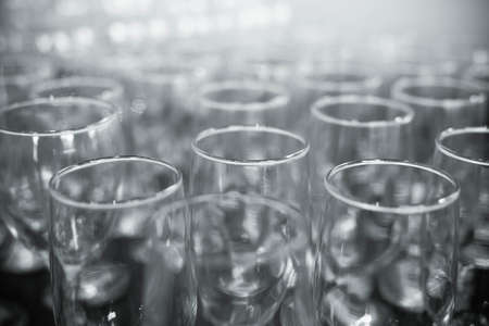 empty glasses on a banquet table close-upの写真素材