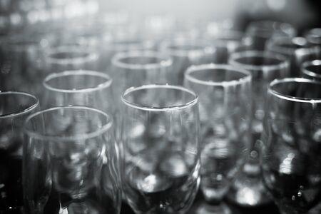 empty glasses on a banquet table close-upの写真素材