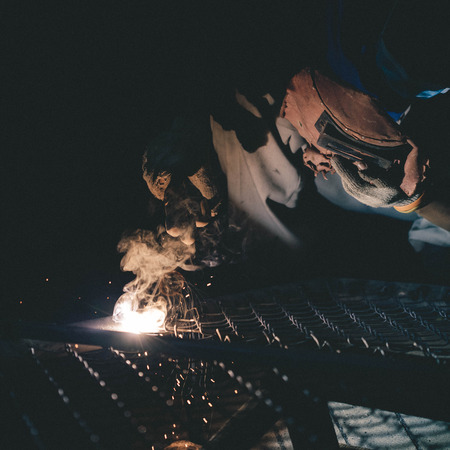 welding metal and sparksの写真素材