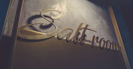 Salt room volumetric lettering decoration inscription at the spa hotel. Entrance sign Salt room title type at the wellness center, closeup.の写真素材