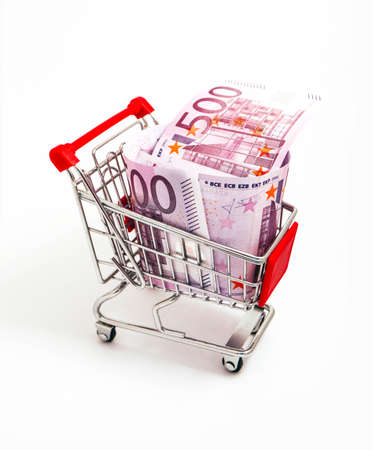Metal basket with an Euro 500 banknote in it. Consumption, shopping concept, pushcart.の写真素材