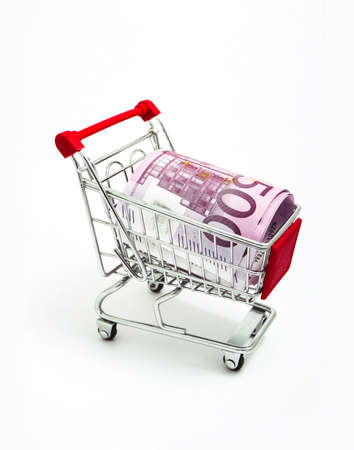 Metal basket with an Euro 500 banknote in it. Consumption, shopping concept, pushcart.の写真素材