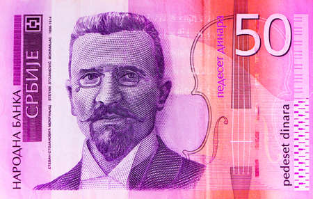 Serbian 50 dinar currency banknote, close up. Serbia money RSD cash, macro view, portrait of Stevan Mokranjac.の写真素材